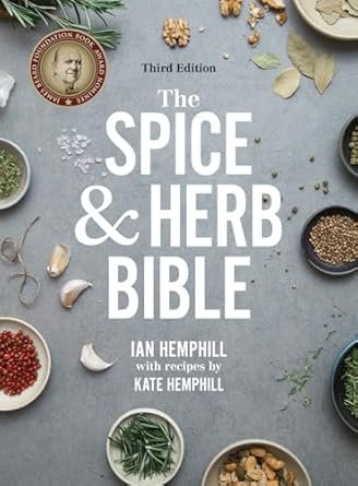 Cover of "The Spice & Herb Bible," Third Edition, featuring an arrangement of various herbs and spices, with the title prominently displayed in white text.